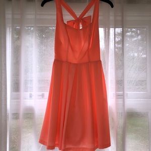 Boutique dress with bow and criss cross back